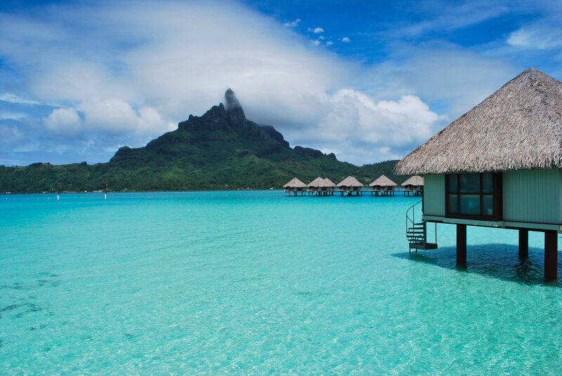 Overwater Bungalows — Blue, Serene, Afternoon, Photograph, Mountain, Thatched Roof