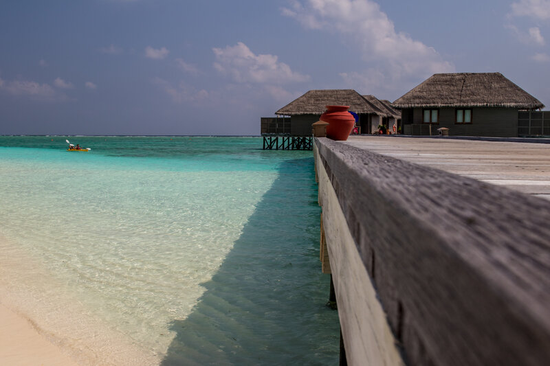 Overwater Bungalows — Blue, Serene, Afternoon, Photograph, Paddle Boat