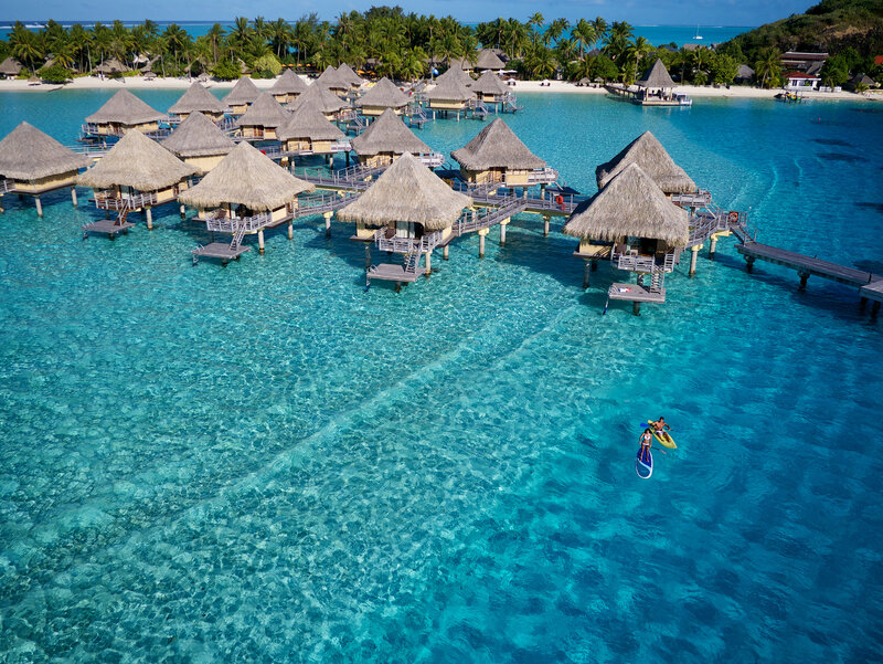 Overwater Bungalows — Blue, Serene, Afternoon, Photograph, Palm Trees, Beach, Kayak