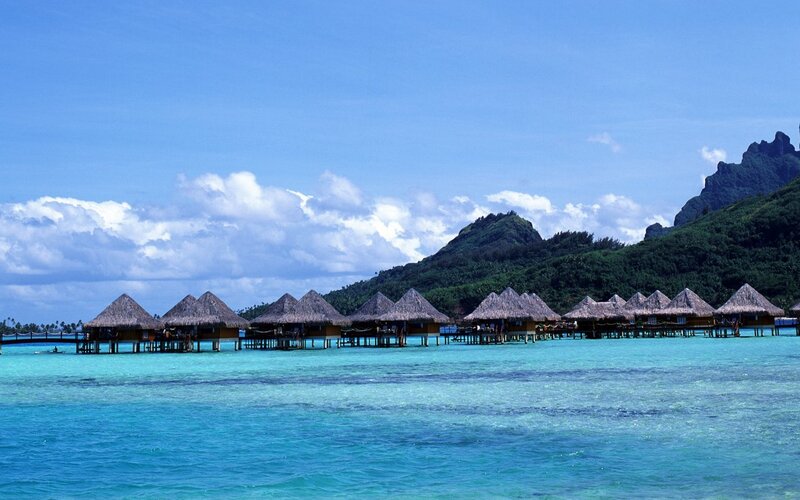 Overwater Bungalows — Blue, Serene, Afternoon, Photograph, Thatched Roofs, Mountain