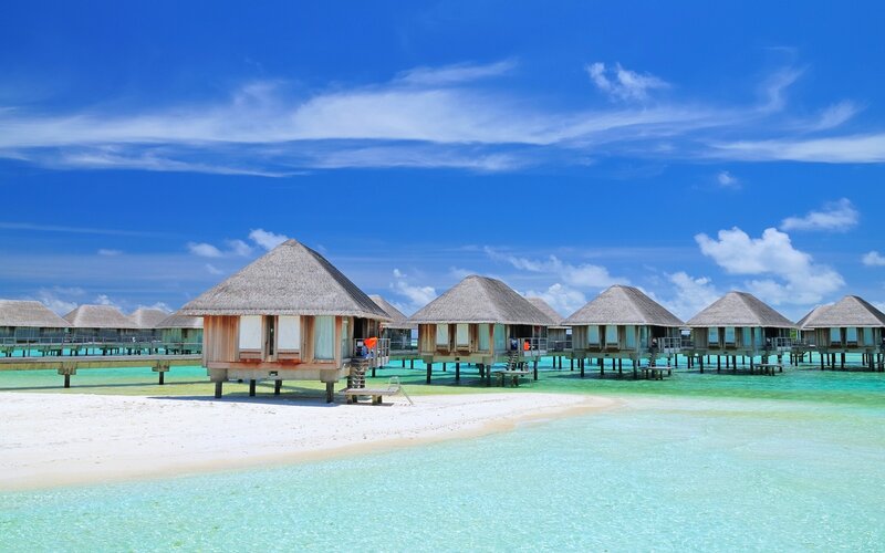 Overwater Bungalows — Blue, Serene, Afternoon, Photograph, Thatched Roofs, White Sand