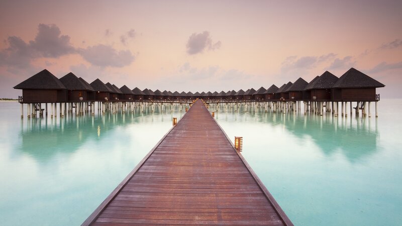 Overwater Bungalows — Blue, Serene, Sunset, Photograph, Pier, Ocean, Brown