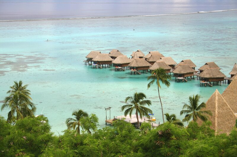 Overwater bungalows in a tropical lagoon