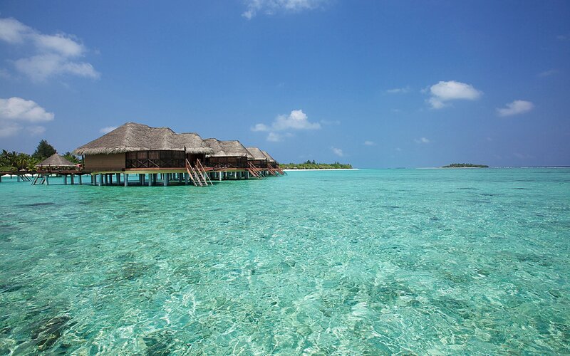 Overwater bungalows in tropical paradise