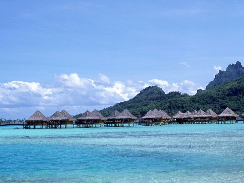 Overwater bungalows in tropical paradise
