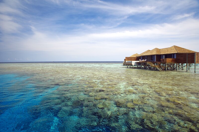 Overwater bungalows in tropical paradise