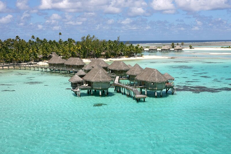 Overwater bungalows in tropical paradise