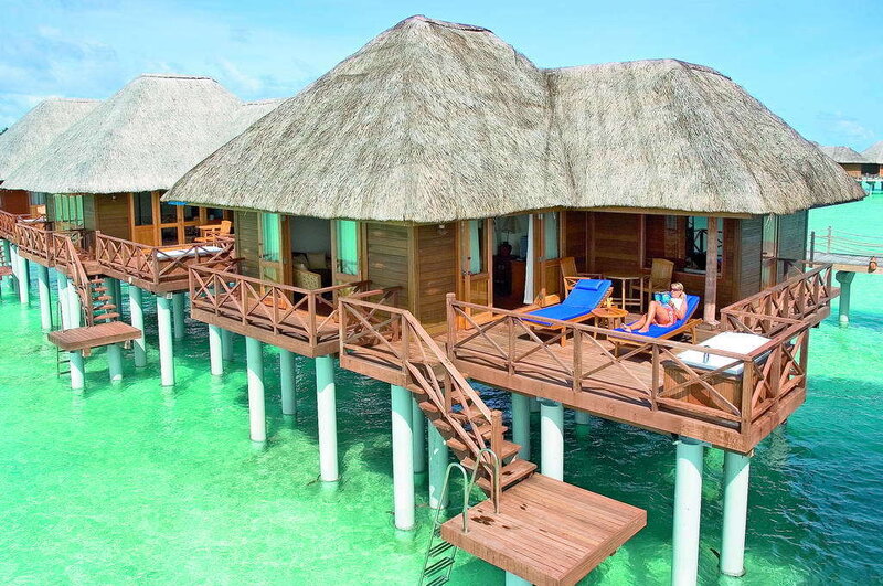 Overwater bungalows in tropical resort