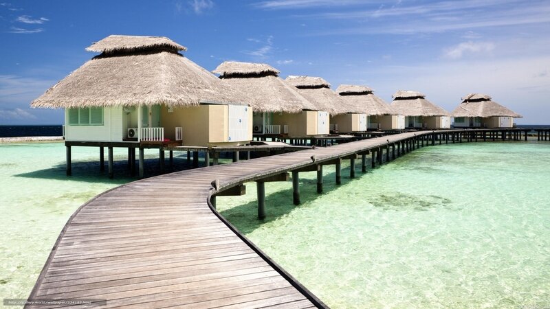 Overwater bungalows in tropical resort