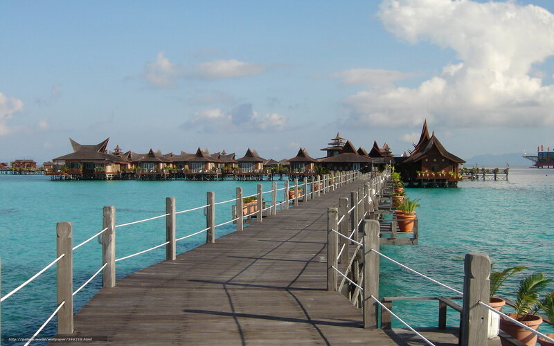 Overwater bungalows in tropical resort