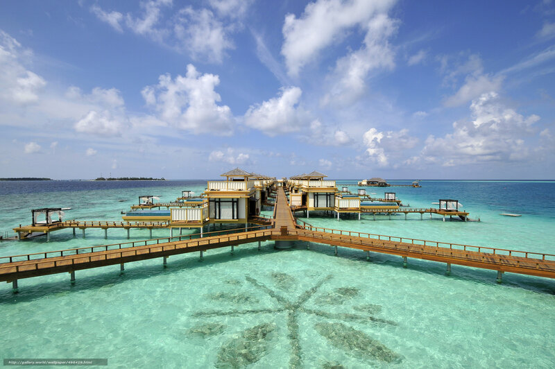 Overwater bungalows in tropical resort
