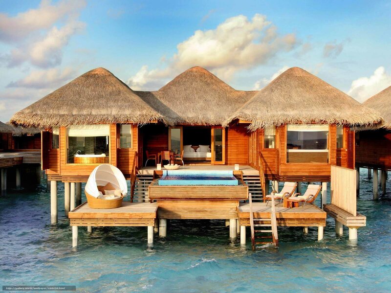 Overwater bungalows in tropical resort
