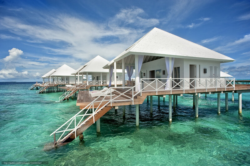 Overwater bungalows in tropical resort