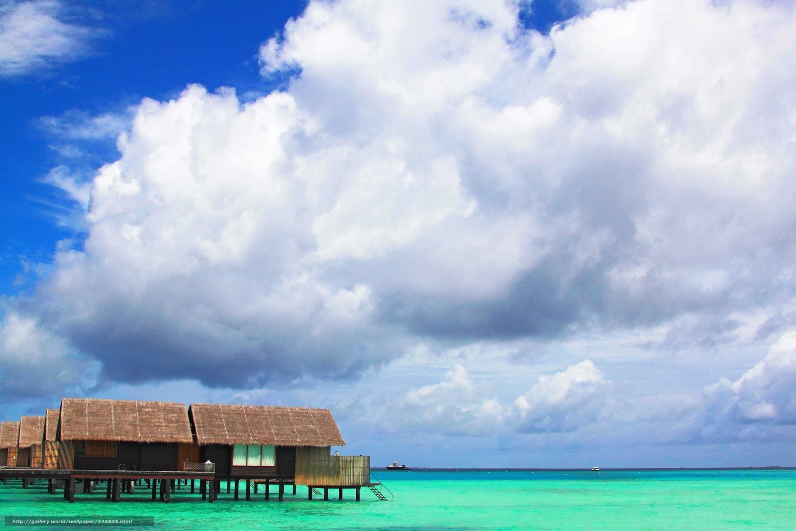 Overwater bungalows in turquoise sea