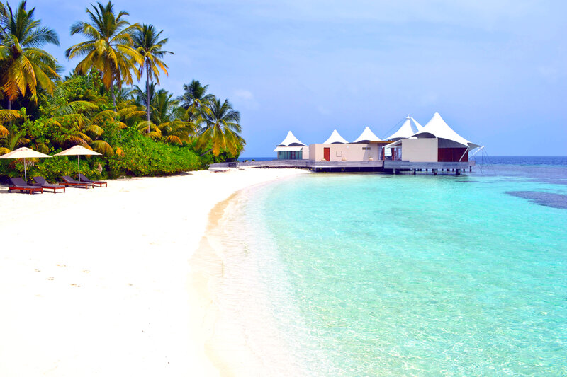 Overwater Bungalows on Beach — White, Serene