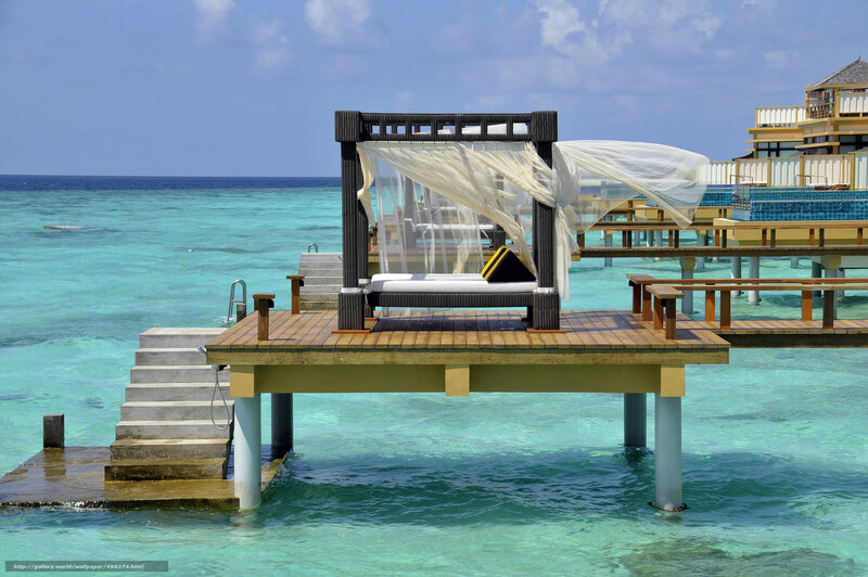 Overwater cabana in tropical resort