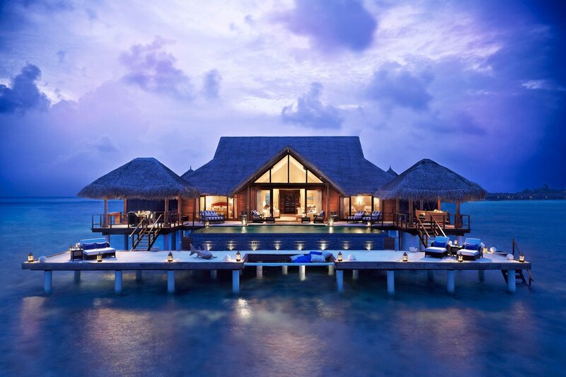 Overwater Villa at Dusk — Blue, Serene, Night, Photograph, Thatched Roofs, Pool