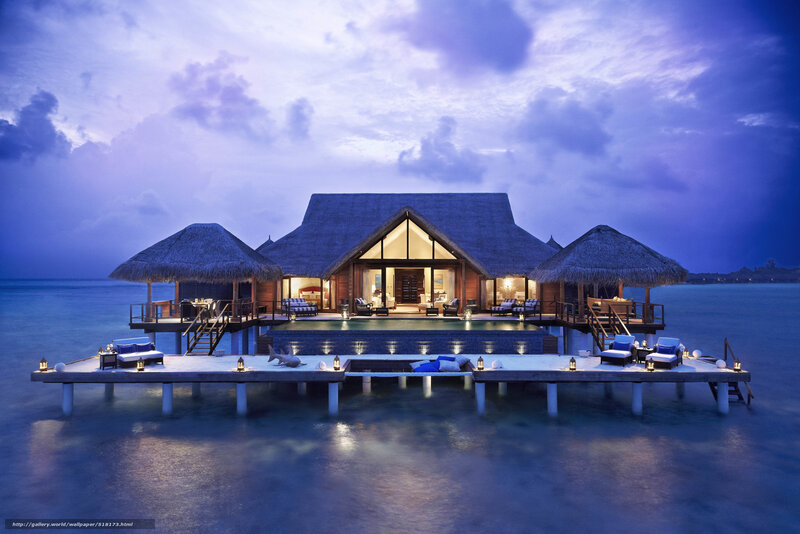Overwater Villa at Dusk — Blue, Serene, Night, Photograph, Thatched Roofs