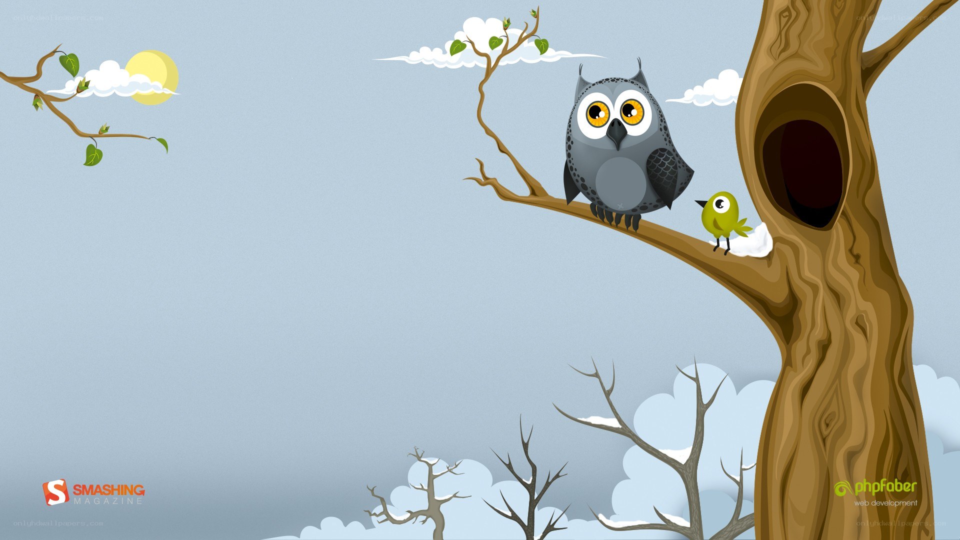 Owl and bird on a tree branch