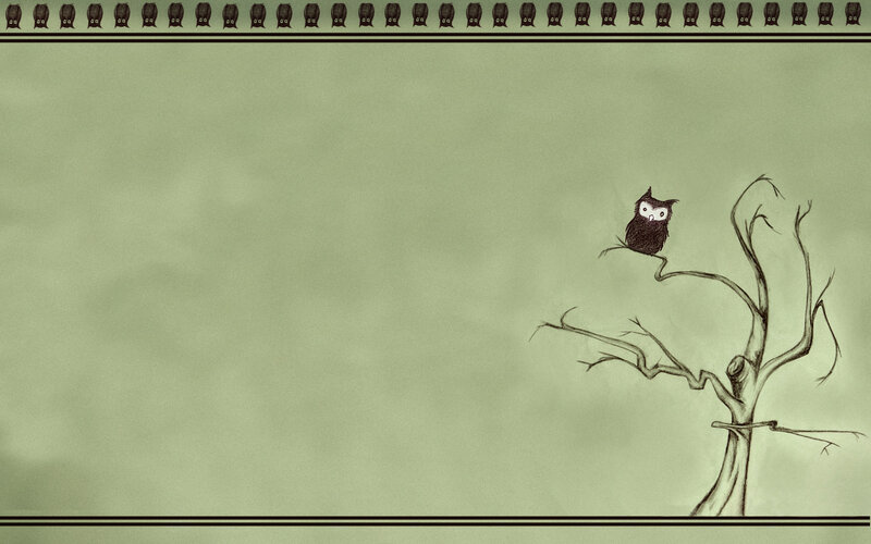 Owl on a bare tree