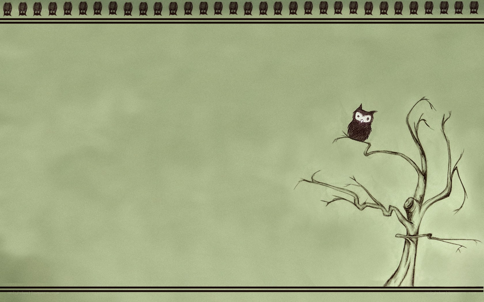 Owl on a bare tree