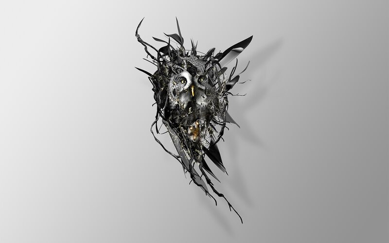 Owl sculpture in a nest