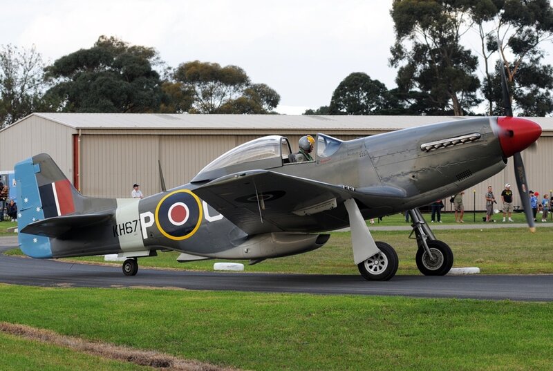 P-51 Mustang Aircraft — Gray, Calm, Afternoon, Photograph