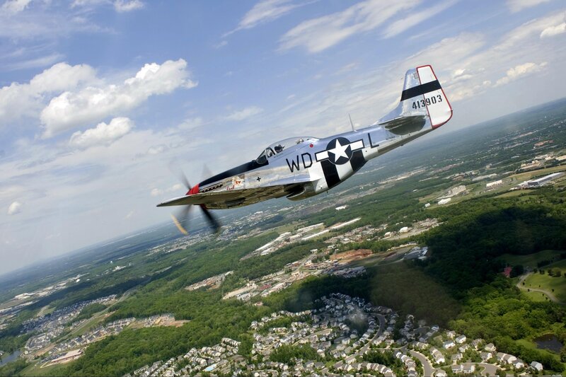 P-51 Mustang Airplane — Blue, Dynamic, Afternoon, Photograph, City