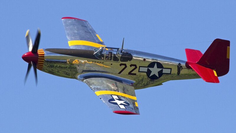 P-51 Mustang Airplane — Blue, Dynamic, Afternoon, Photograph, Propeller, Star Insignia, Red Tail