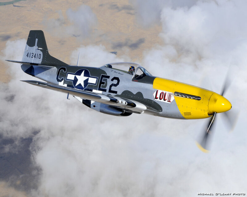 P-51 Mustang Airplane — Gray, Dynamic, Afternoon, Photograph, Clouds