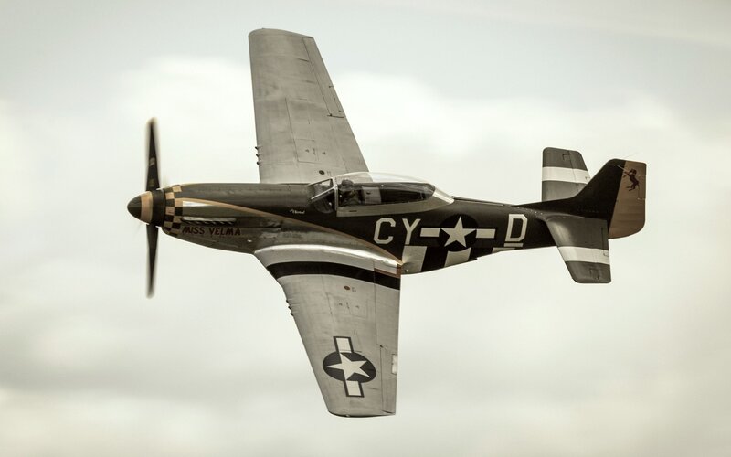 P-51 Mustang Airplane — Gray, Dynamic, Photograph, Propeller, Clouds