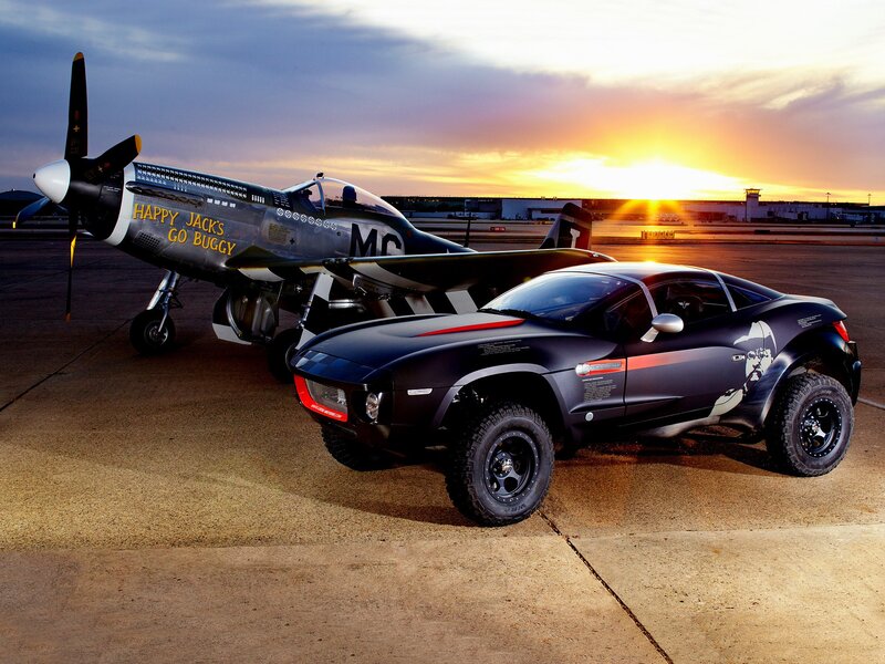 P-51 Mustang and concept car at sunset