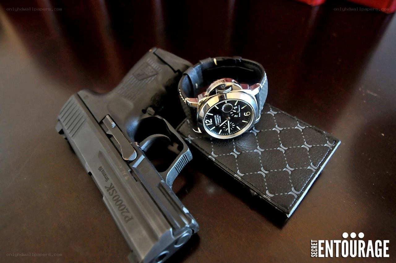 P2000SK pistol and watch