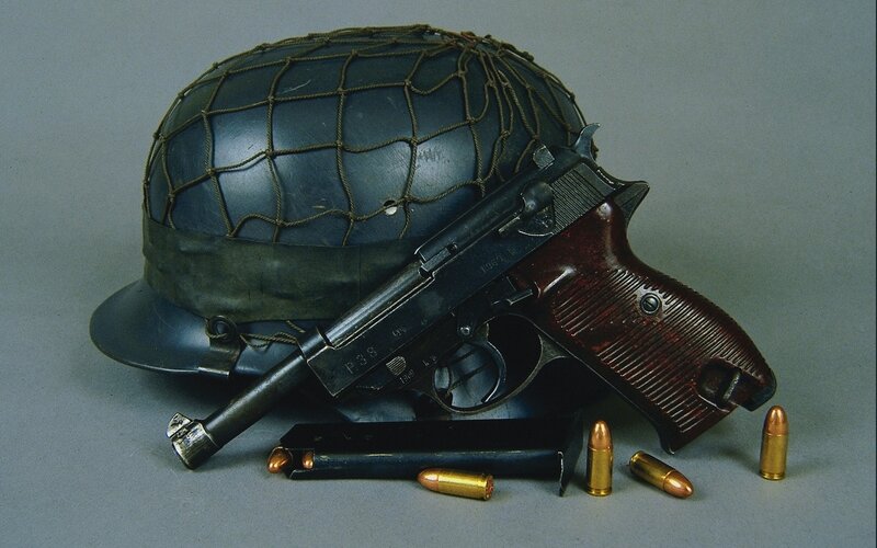 P38 pistol with helmet and ammunition