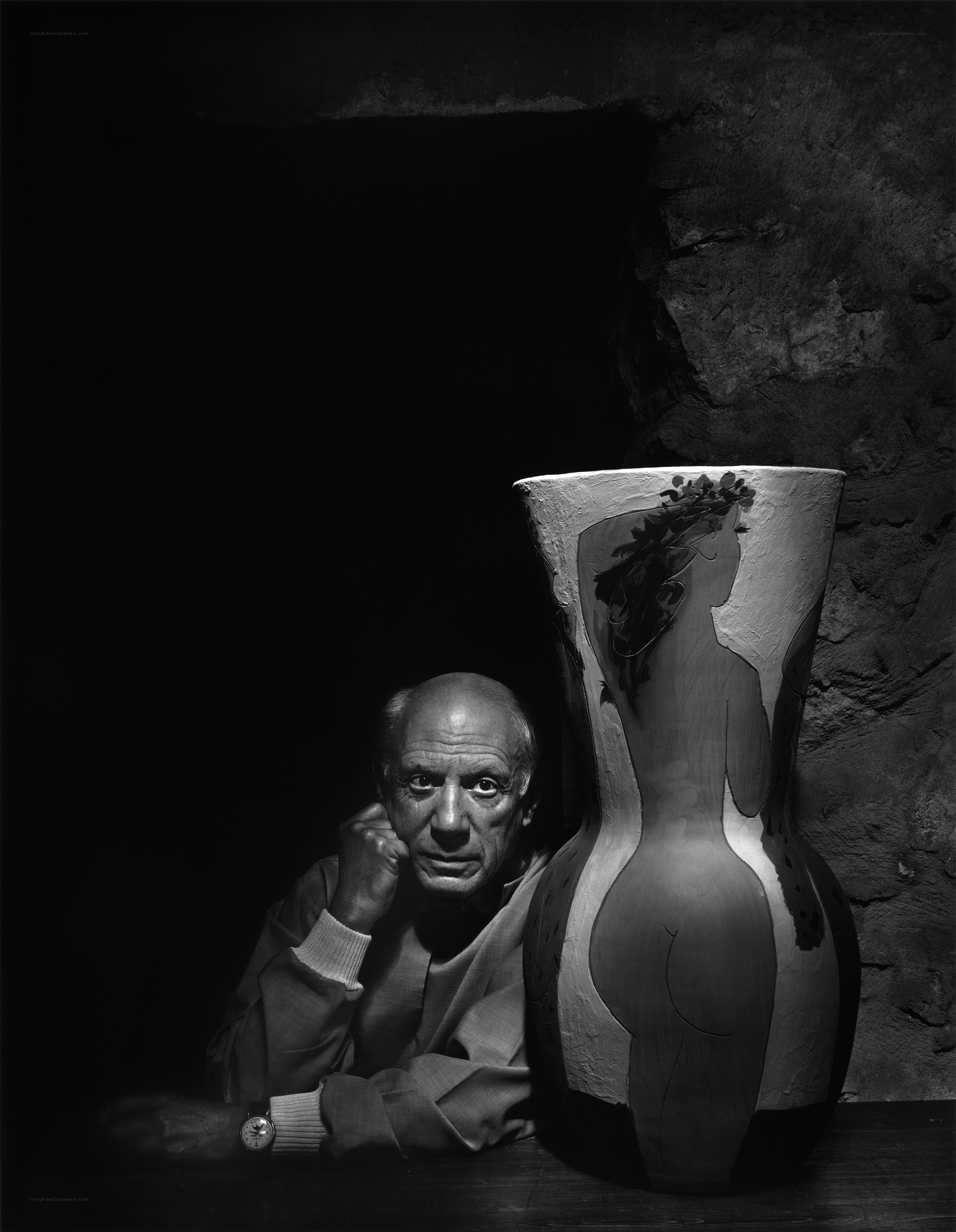 Pablo Picasso with a vase