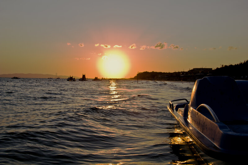 Paddle Boat at Sunset — Orange