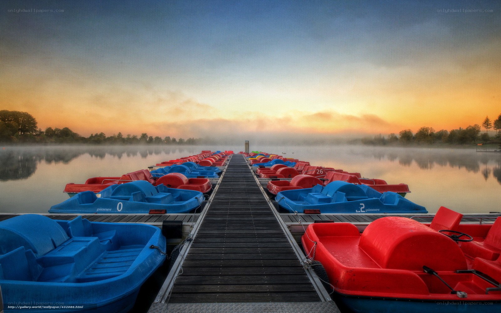 Paddle boats at sunrise