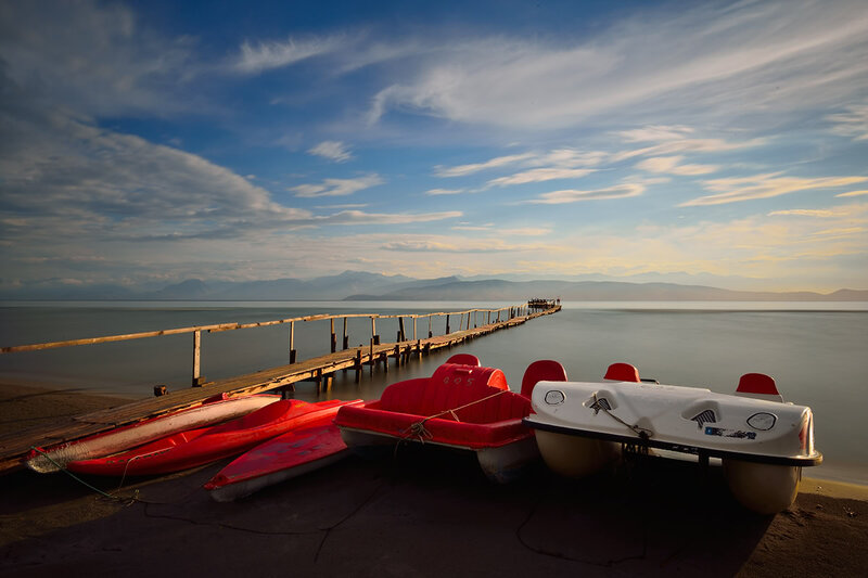 Paddle Boats on Lake Shore