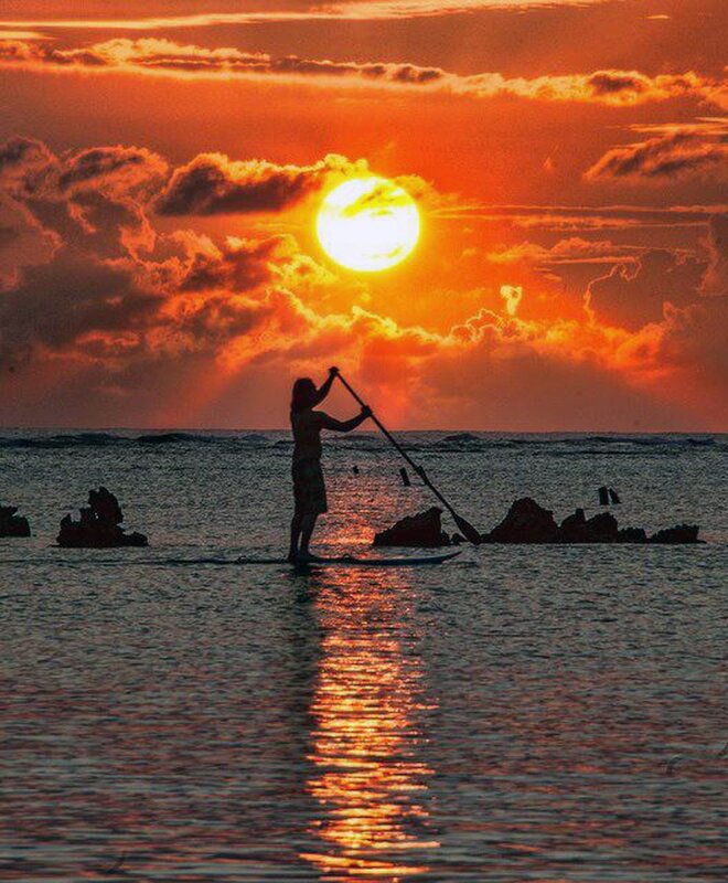 Paddleboarding at sunset