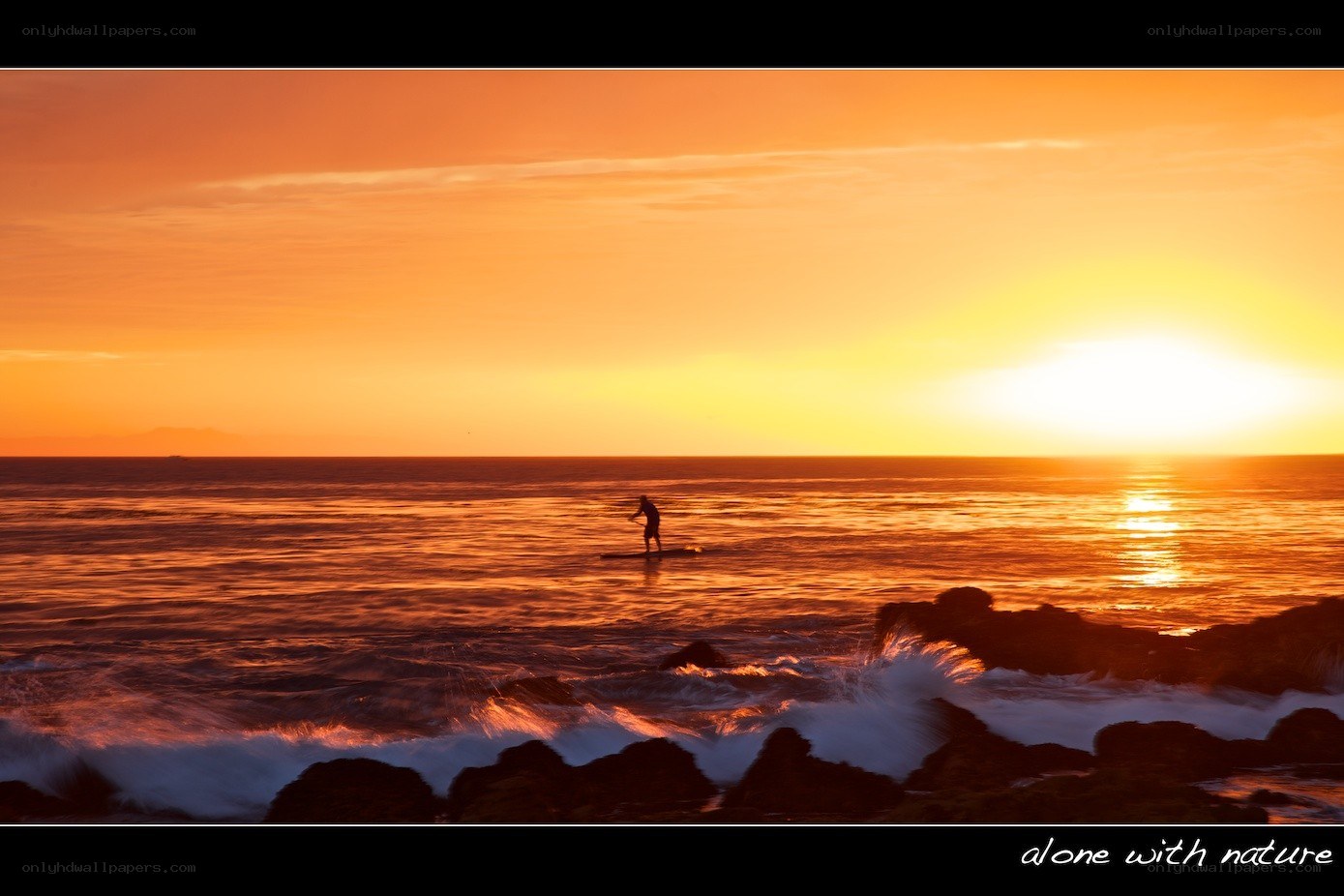 Paddleboarding at sunset