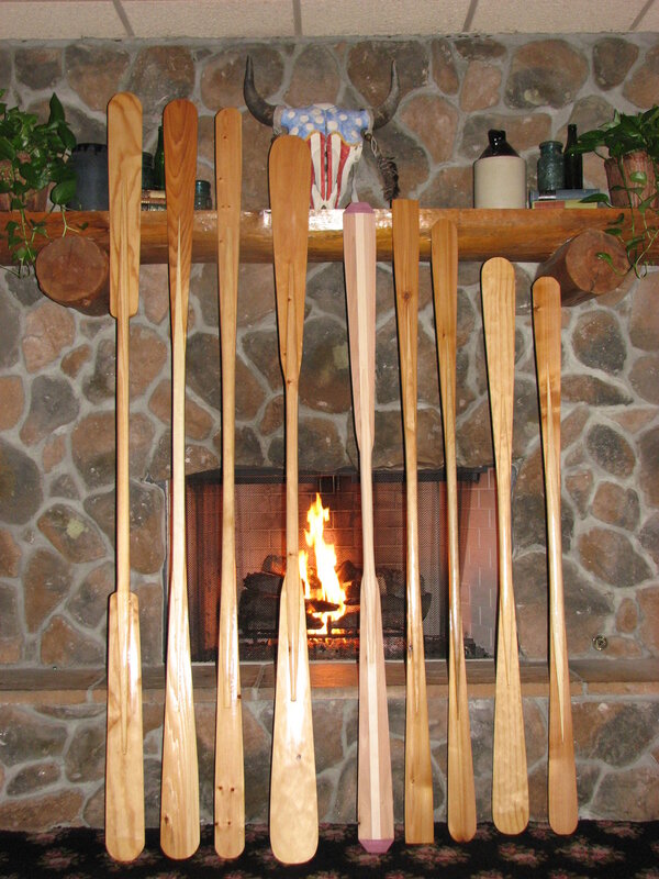 Paddles by a fireplace