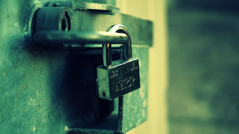 padlock on metal gate