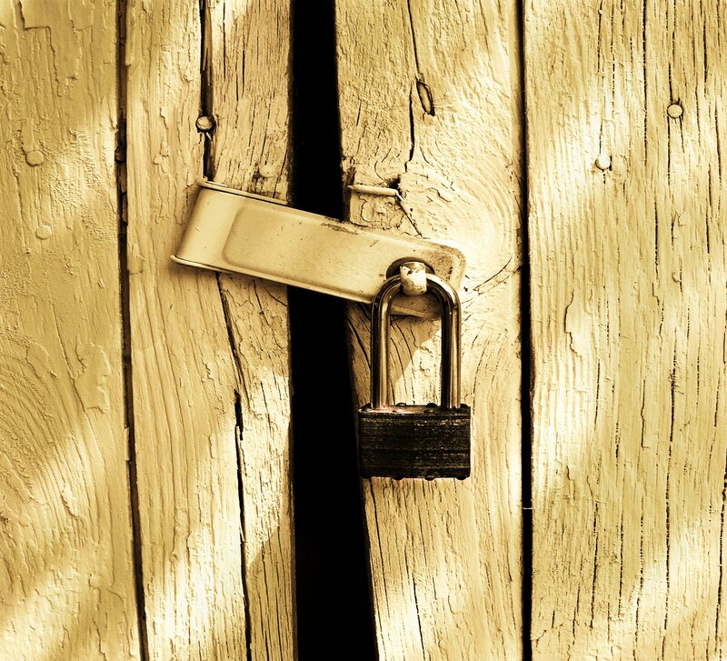 Padlock on Wooden Door