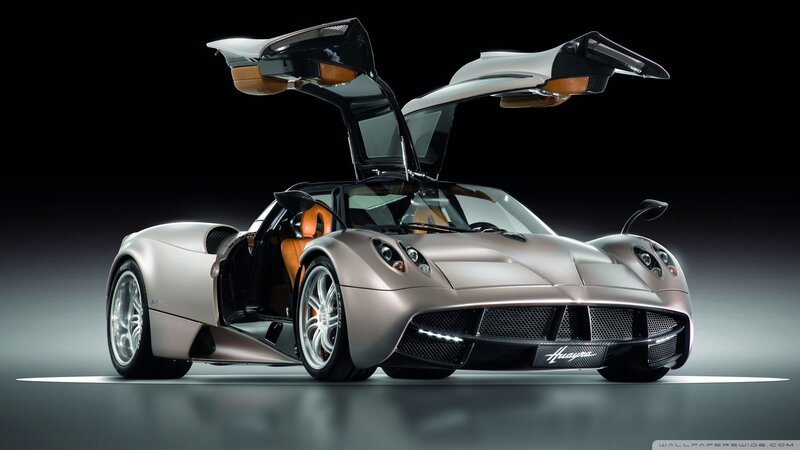 Pagani Huayra Sports Car — Silver, Dramatic, Photograph, Open Doors, Orange Interior, Wheels, Black