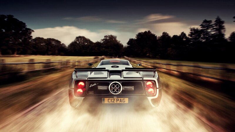 Pagani Zonda speeding on country road