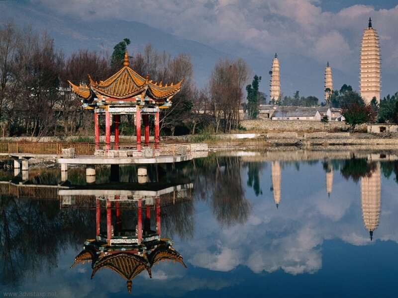 Pagoda towers reflected in a lake