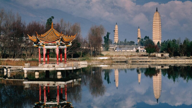 Pagoda towers reflected in a lake