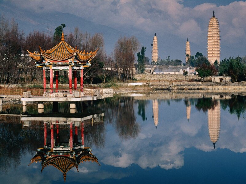 Pagoda towers reflected in lake