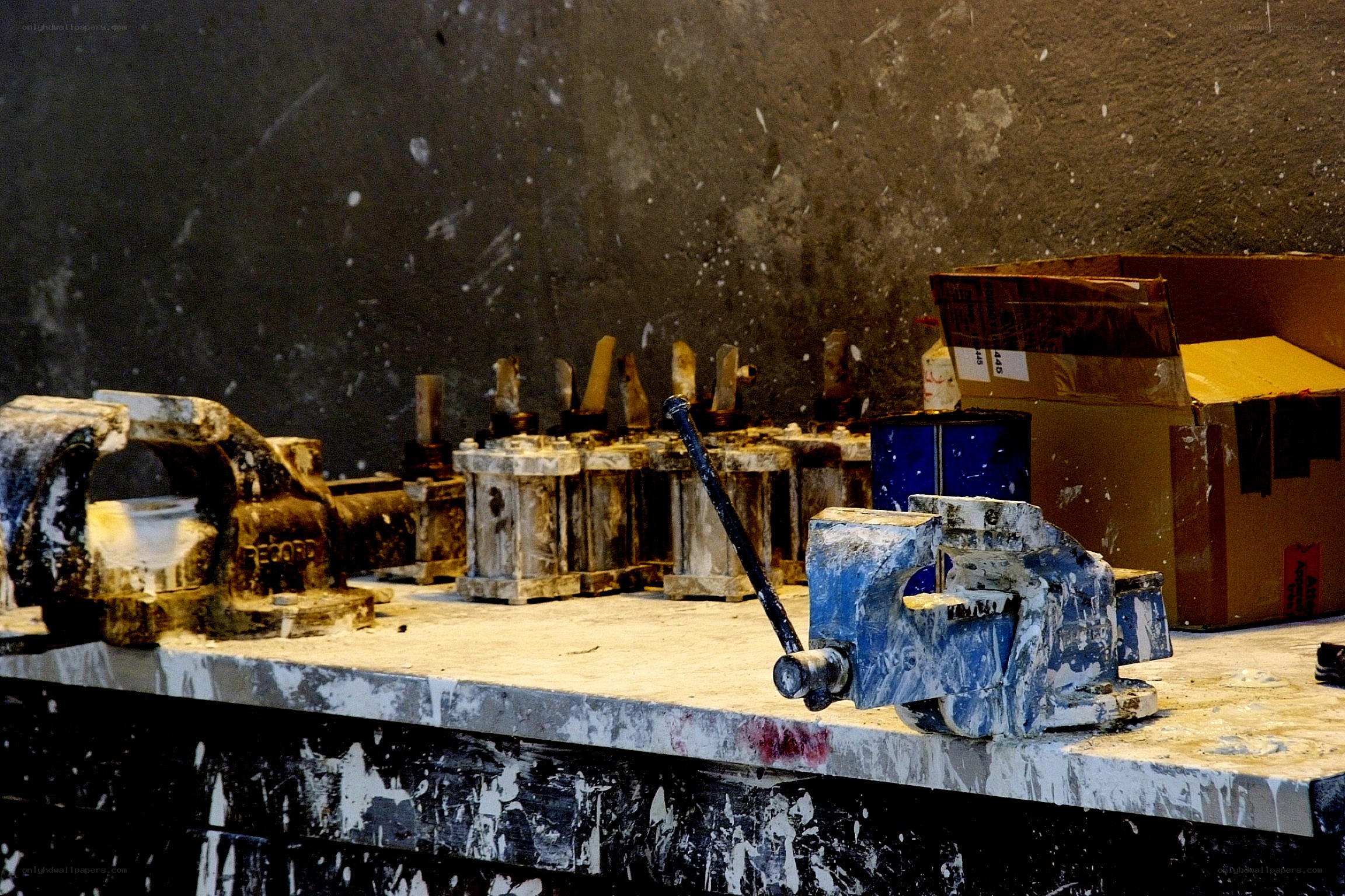 paint-splattered workshop tools