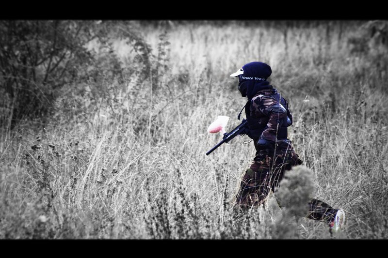 Paintball player in field